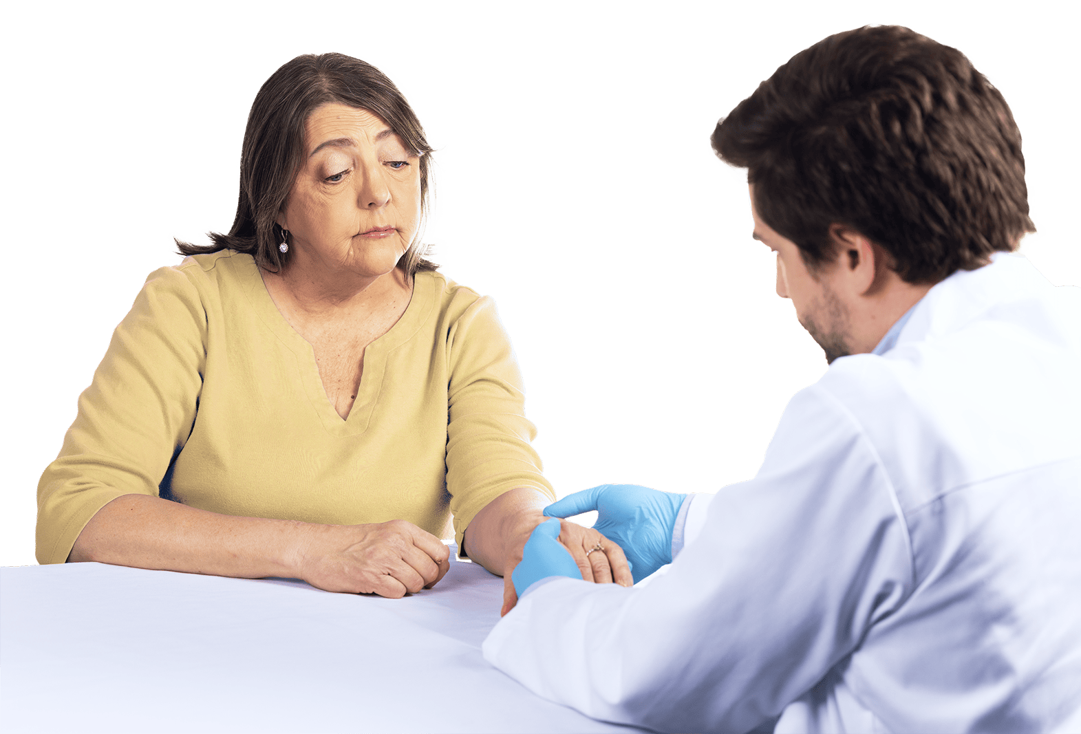 Doctor examining warts on WHIM syndrome patient hands